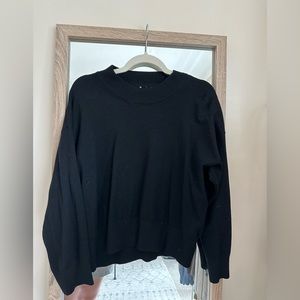 Plain black crew neck sweater. Target brand. Worn once.